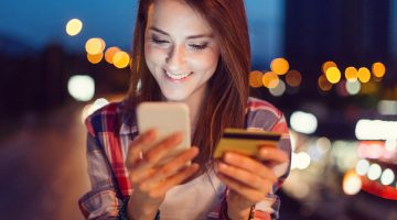 Smiling woman shopping online